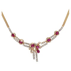 Collier en or jaune 18k composé de 4.55tcw rubis et 3.01tcw J VS diamant