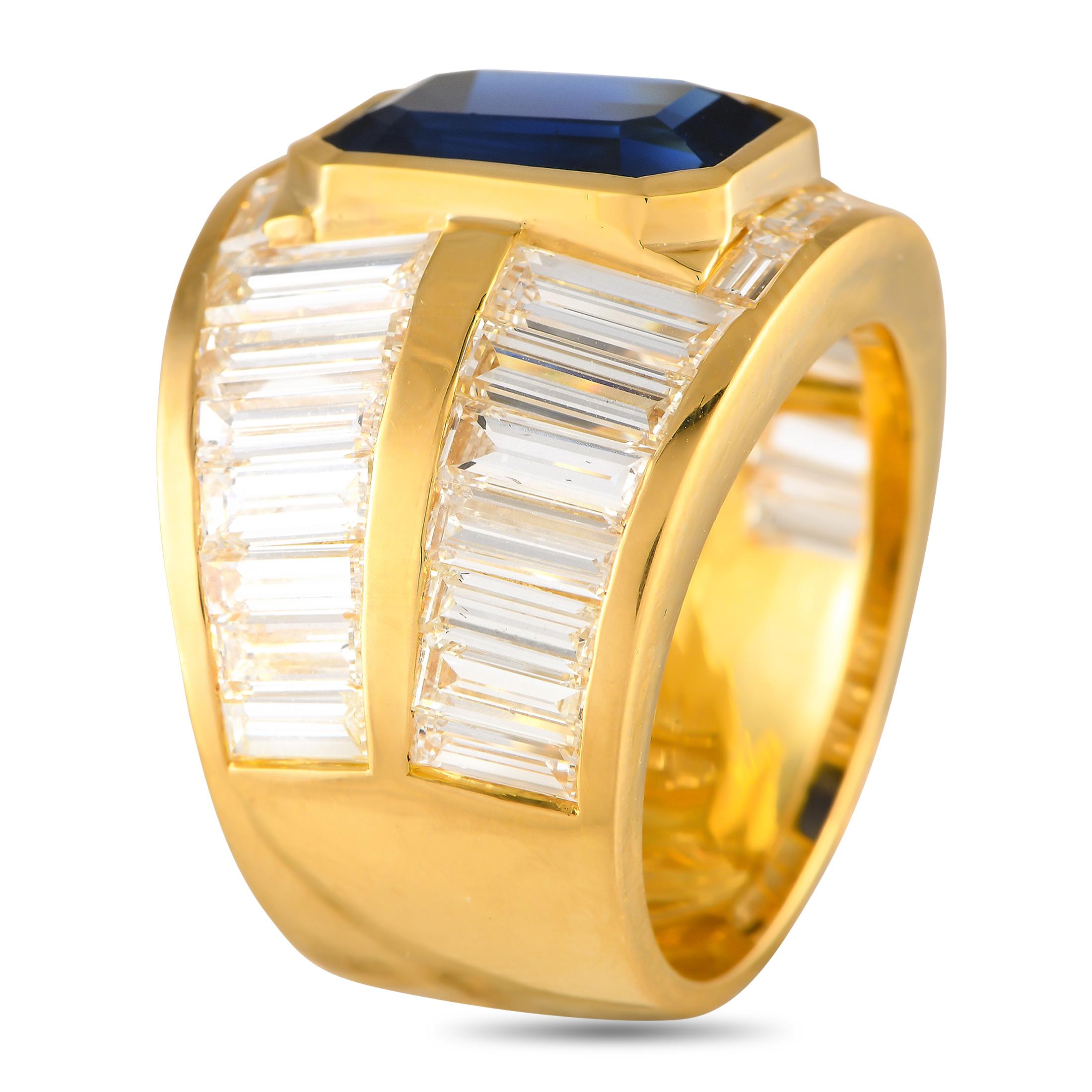 With a wide band and a channel setting, here's the ring for the bold and daring. This piece features a yellow gold band designed with two tracks or channels of tapered baguette diamonds. Adding a pop of color to the ring is a mesmerizing blue