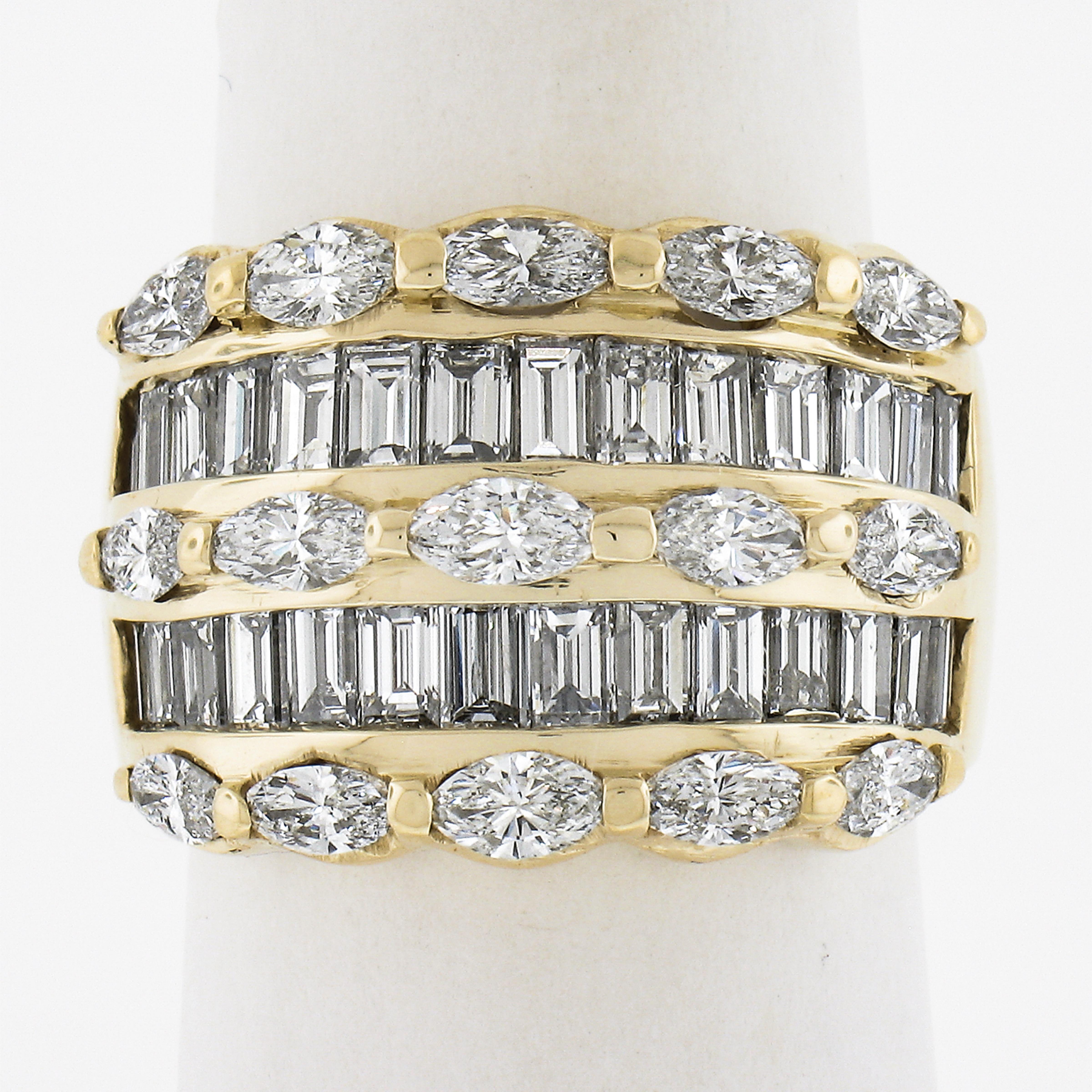 Substantial wide baguette and marquise diamond band/ring. This ring has such a substantial presense on the finger with the low profile baguettes alternating with the higher set marquise diamonds. It is wide enough to be completely noticed but just