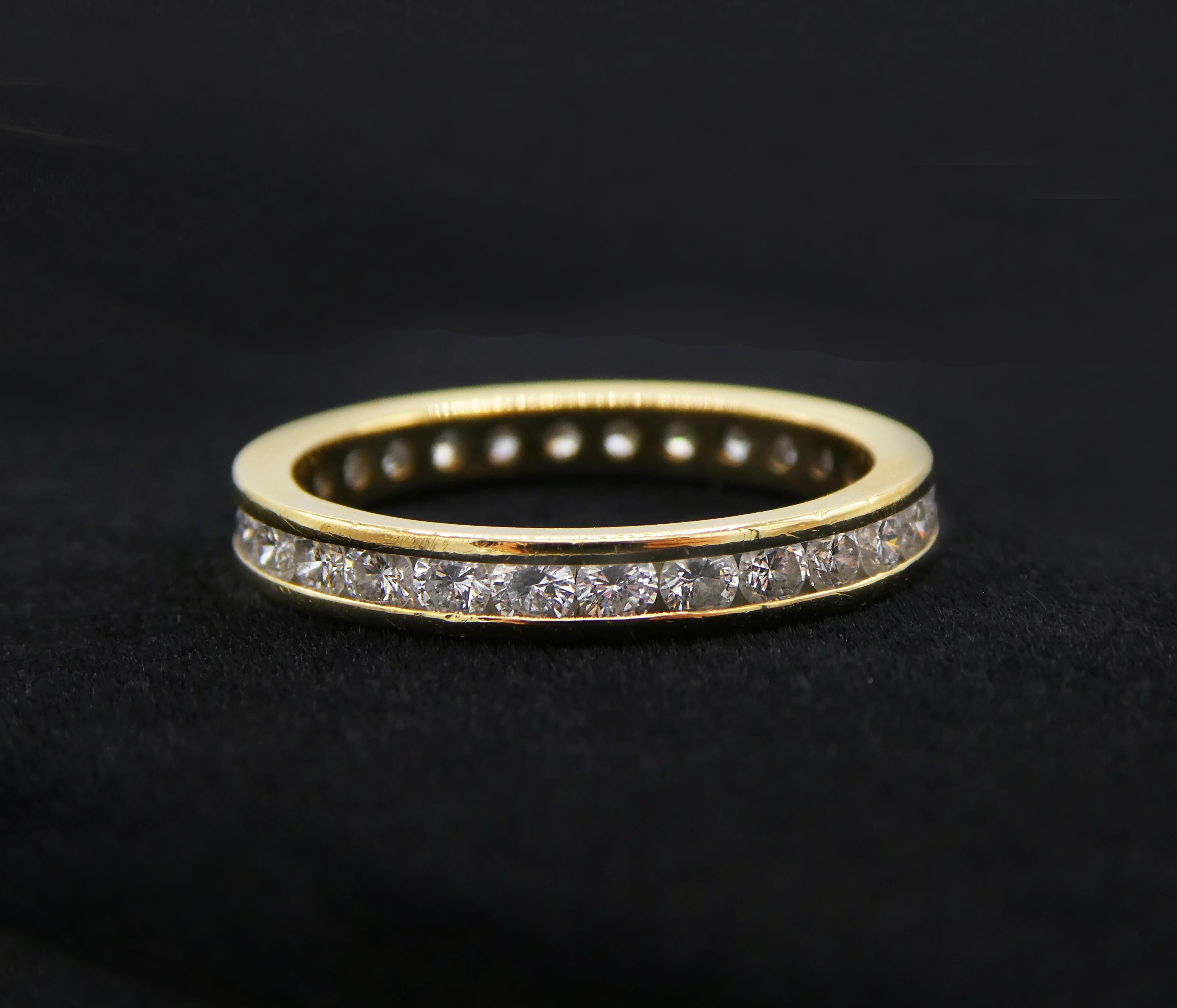 Diamond 0.50 CTW Wedding Band 18k Yellow Gold Channel Set Round Brilliant Cut Ring Size 5

Metal: 18k Yellow Gold
Diamonds: 29 round brilliant cut diamonds approx. 0.50 ctw G-H VS. 
Weight: 2.18 grams
Size: 5
Markings: no marking but has been