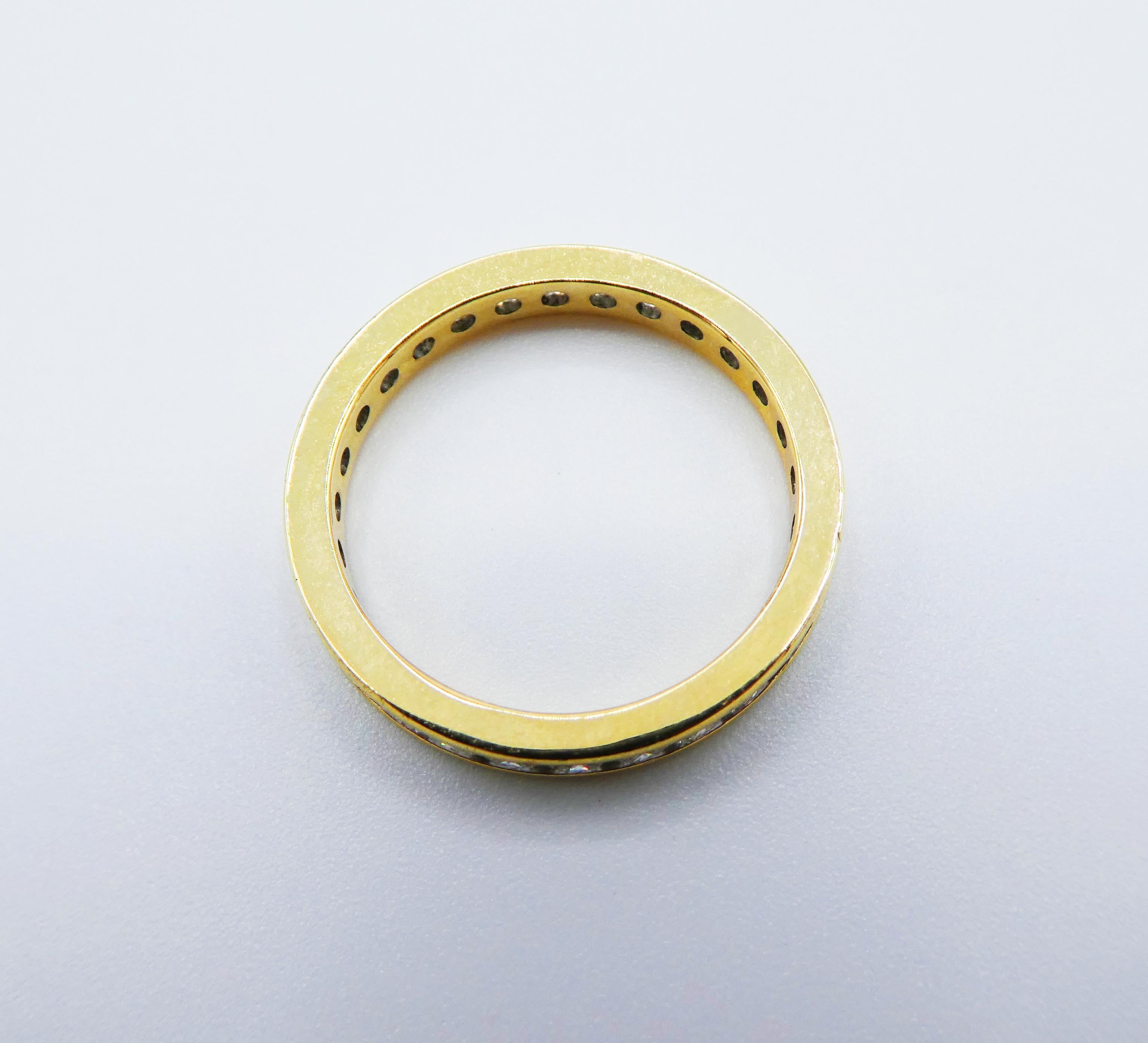 Round Cut 18 Karat Yellow Gold .50 Carat Channel Set Diamond Eternity Band Ring
