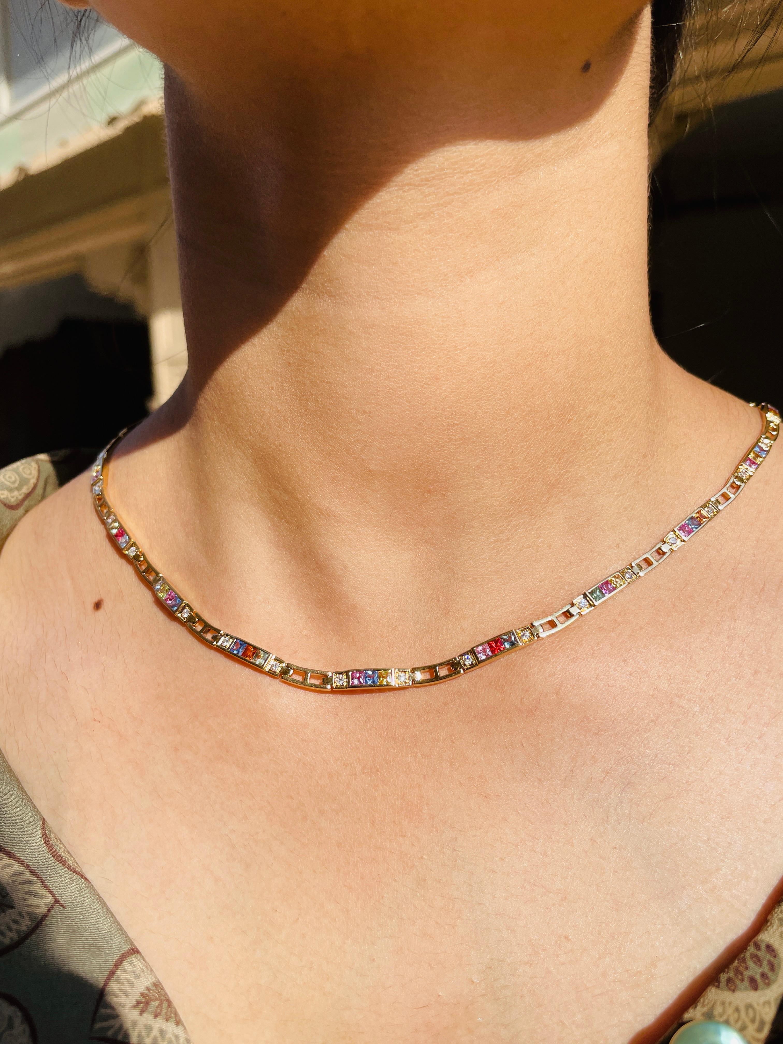 Multi Sapphire Necklace in 18K Gold studded with square cut sapphire pieces and diamonds.
Accessorize your look with this elegant sapphire beaded necklace. This stunning piece of jewelry instantly elevates a casual look or dressy outfit. Comfortable