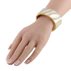 Bracciale in oro giallo 18 carati con diamanti da 5,78 carati e madreperla MF04-061826