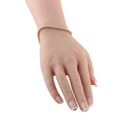 Bracelet « tennis » en or jaune 18 carats serti de diamants (5,90 ct) MF15-062226