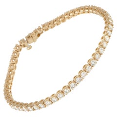 Bracelet « tennis » en or jaune 18 carats serti de diamants (5,90 ct) MF15-062226