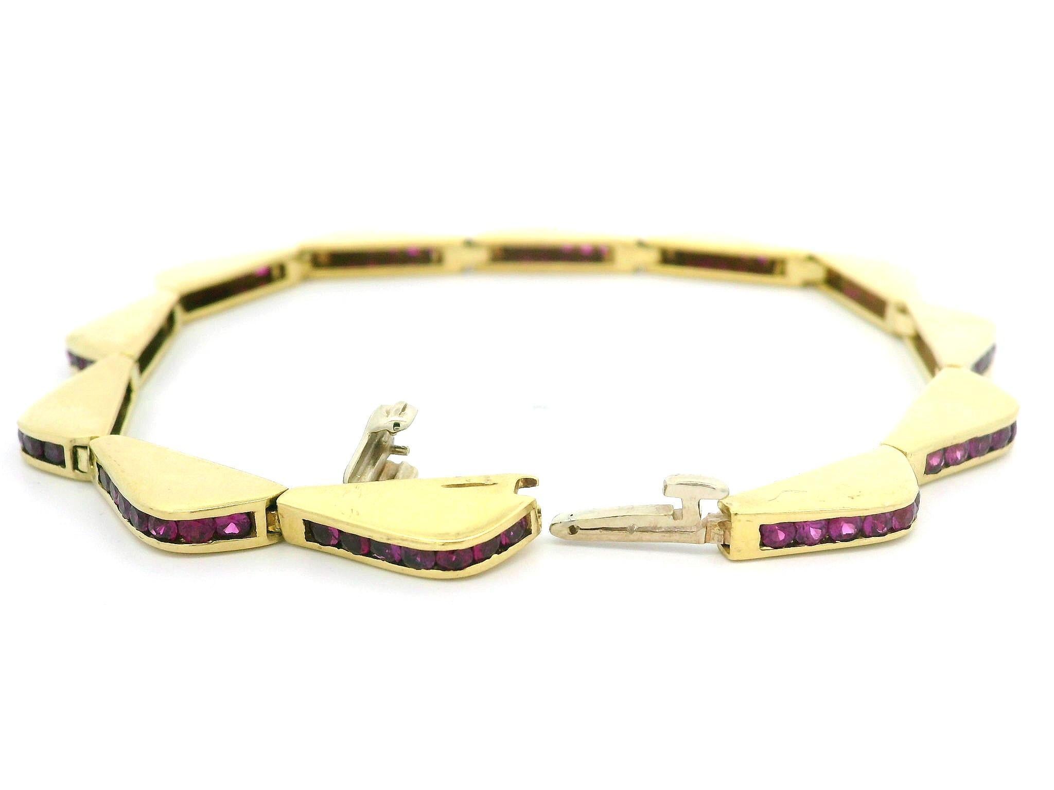 18k Yellow Gold 5ctw Channel Set Ruby Wavy Wave Line Link Bracelet In Excellent Condition For Sale In Montclair, NJ