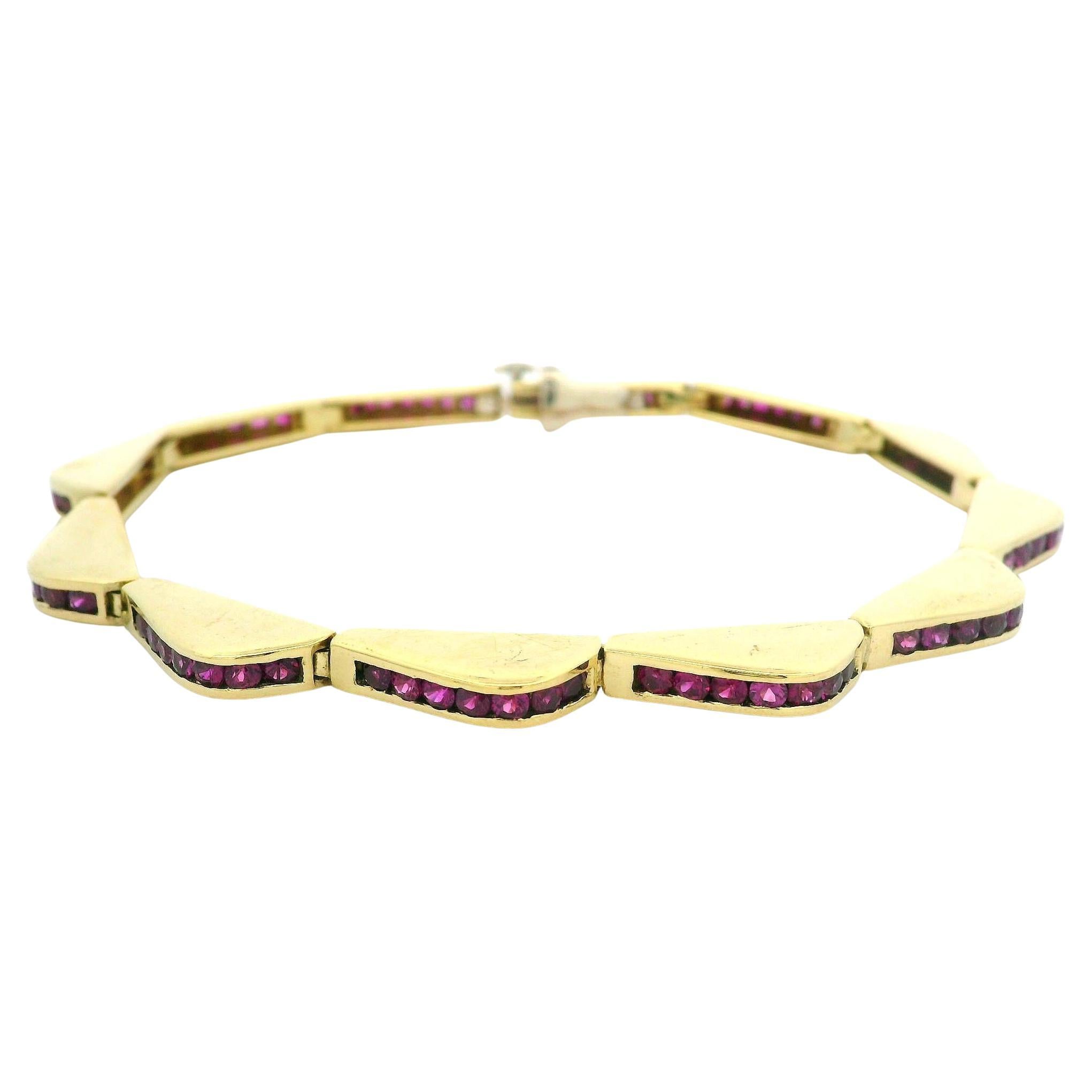 Bracciale A Link in oro giallo 18 carati con rubino incastonato a canale e linea ondulata