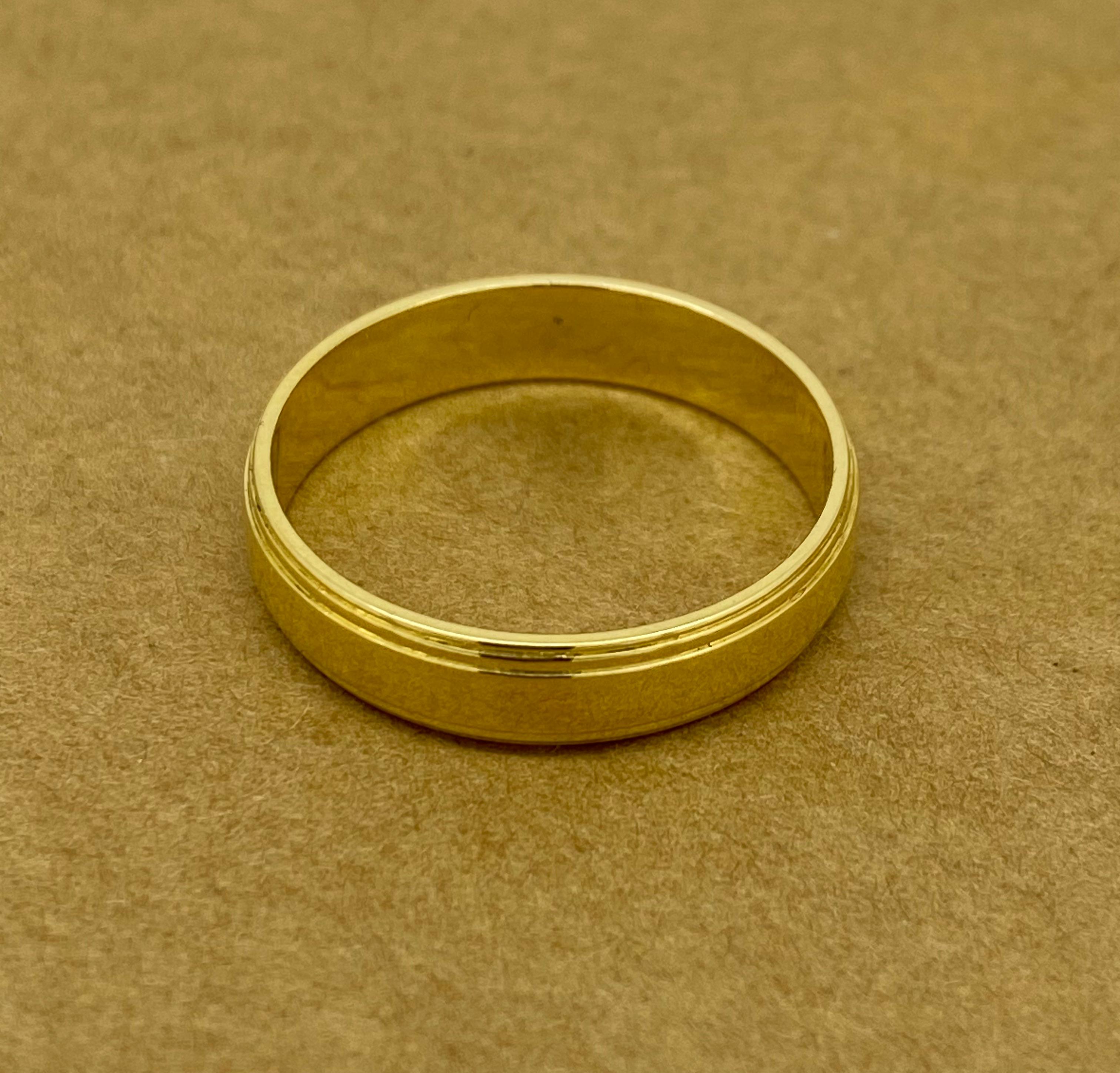 This heavy & solid Mens' Band is of timeless design

It’s retro c1960’s & handmade,
finely crafted in 18K yellow gold  
It measures 5mm in width,
bearing 18ct stamp on inside;
Retailed by Prouds (hallmarked on inside)

Total item's weight: 5.3 gr.
