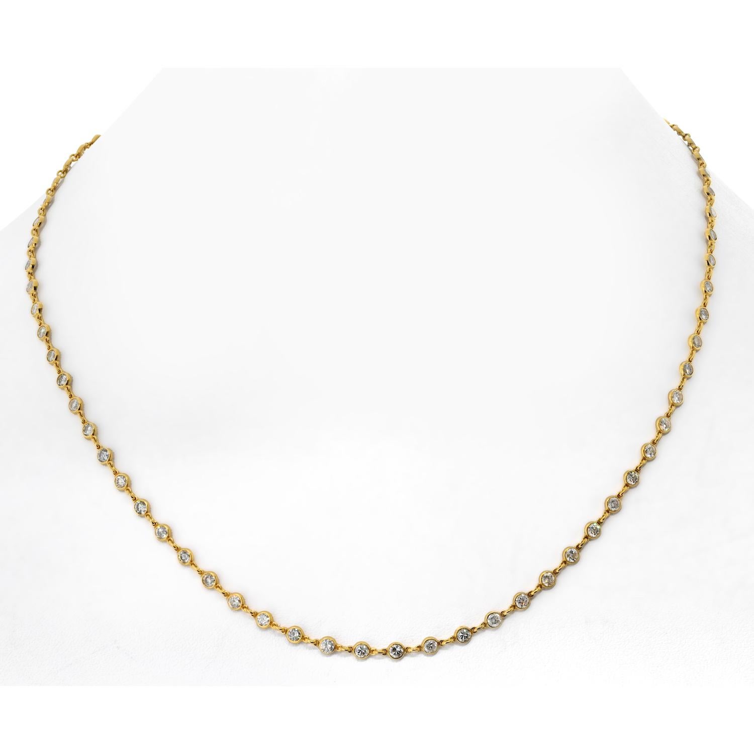 Introducing a truly enchanting piece of jewelry – the Beautiful Handmade Diamond by the Yard Necklace in 18K Yellow Gold. 

This exquisite necklace features a remarkable 6.02carats of natural round brilliant-cut diamonds, each hand-set in radiant