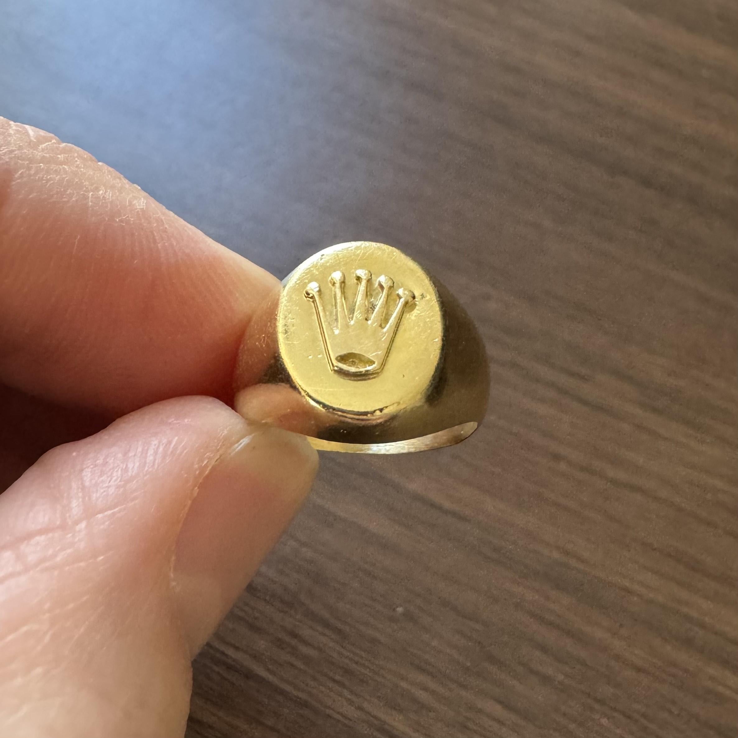 Condition:  Excellent Condition, Professionally Cleaned and Polished
Metal:  18k Gold (Marked, and Professionally Tested)
Weight:  6.1g
Width:  13mm at face, 4mm at back
Size:  5
Markings:  