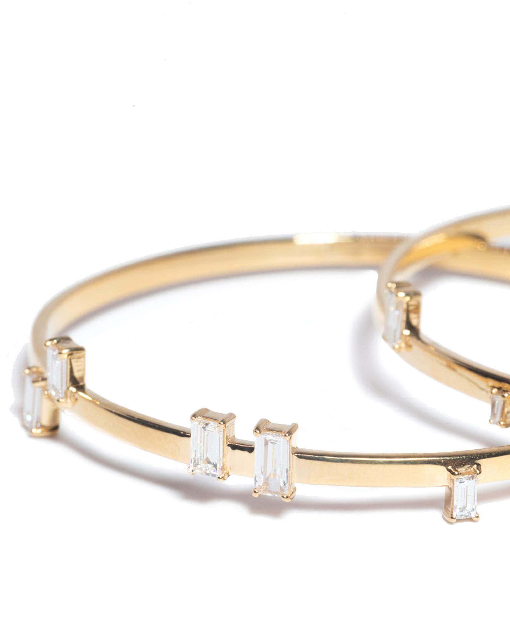 Contemporary 18K Yellow Gold .62 Carat White Diamonds SI1 Baguette Hoop Earrings For Sale