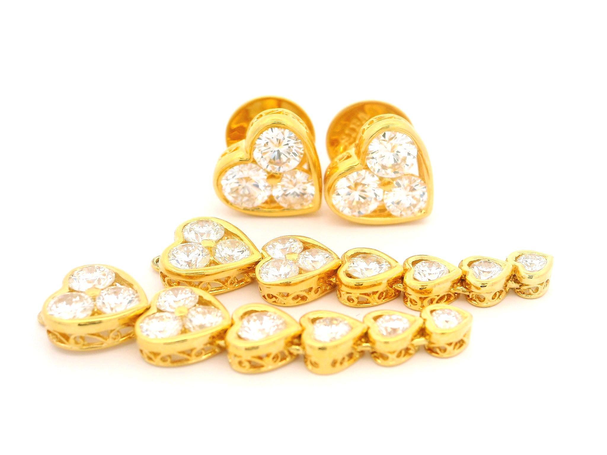 Taglio brillante Orecchini con perno a cuore graduato in oro giallo 18k con diamante grande e incandescente da 6,44 carati in vendita