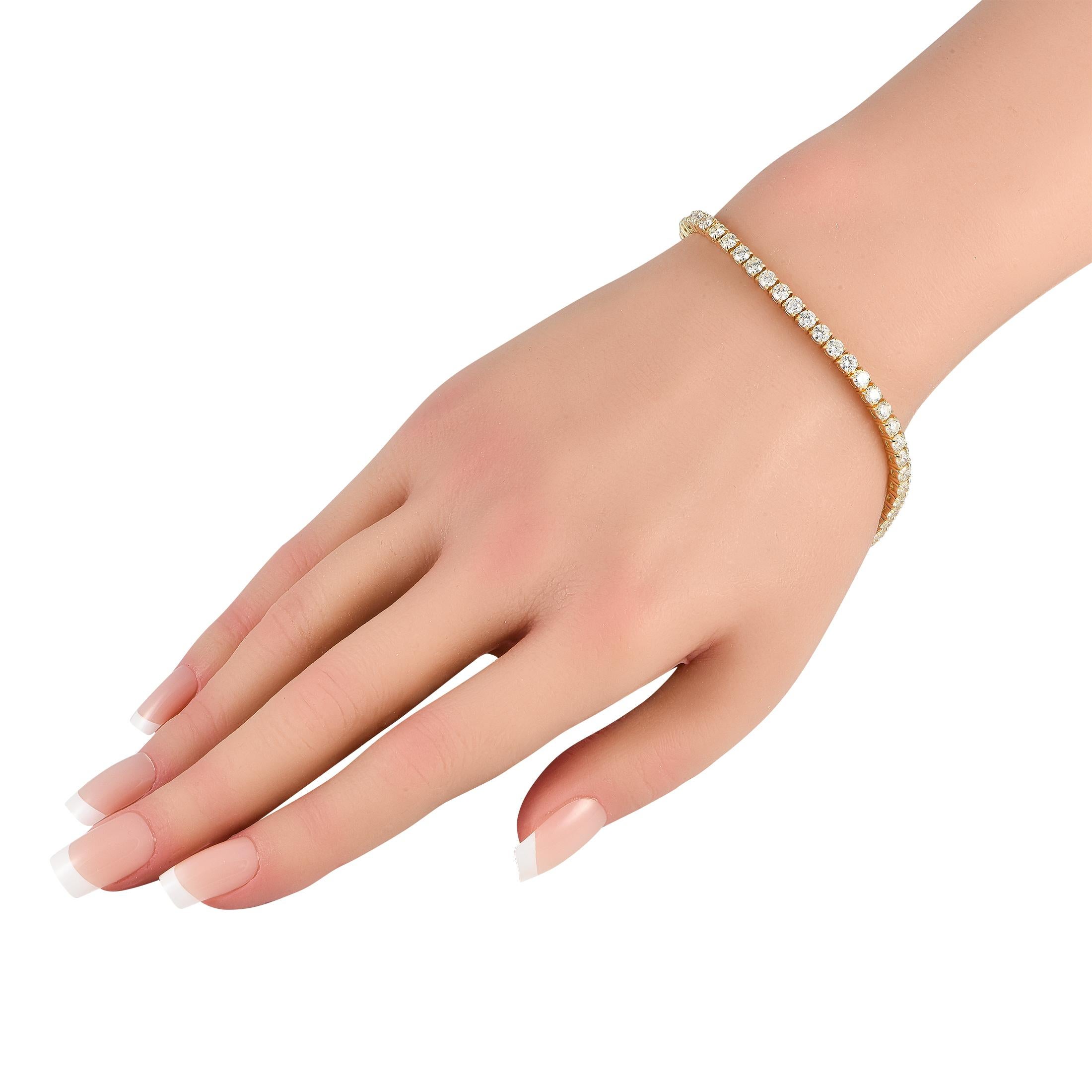 This tennis bracelet is designed to make a subtle statement. On this piece, a series of sparkling Diamonds totaling 6.63 carats are highlighted by an opulent 18K Yellow Gold setting. It measures 7.50 long and is an ideal accessory for any