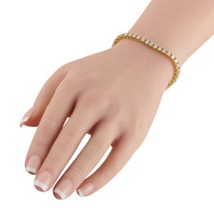 Bracelet « tennis » en or jaune 18 carats serti de diamants (6,90 ct) MF05-060526