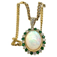 18k Yellow Gold 7.55gm / 6.89ct Natural Opal / Diamond 1.02ct / Emerald 0.83ct