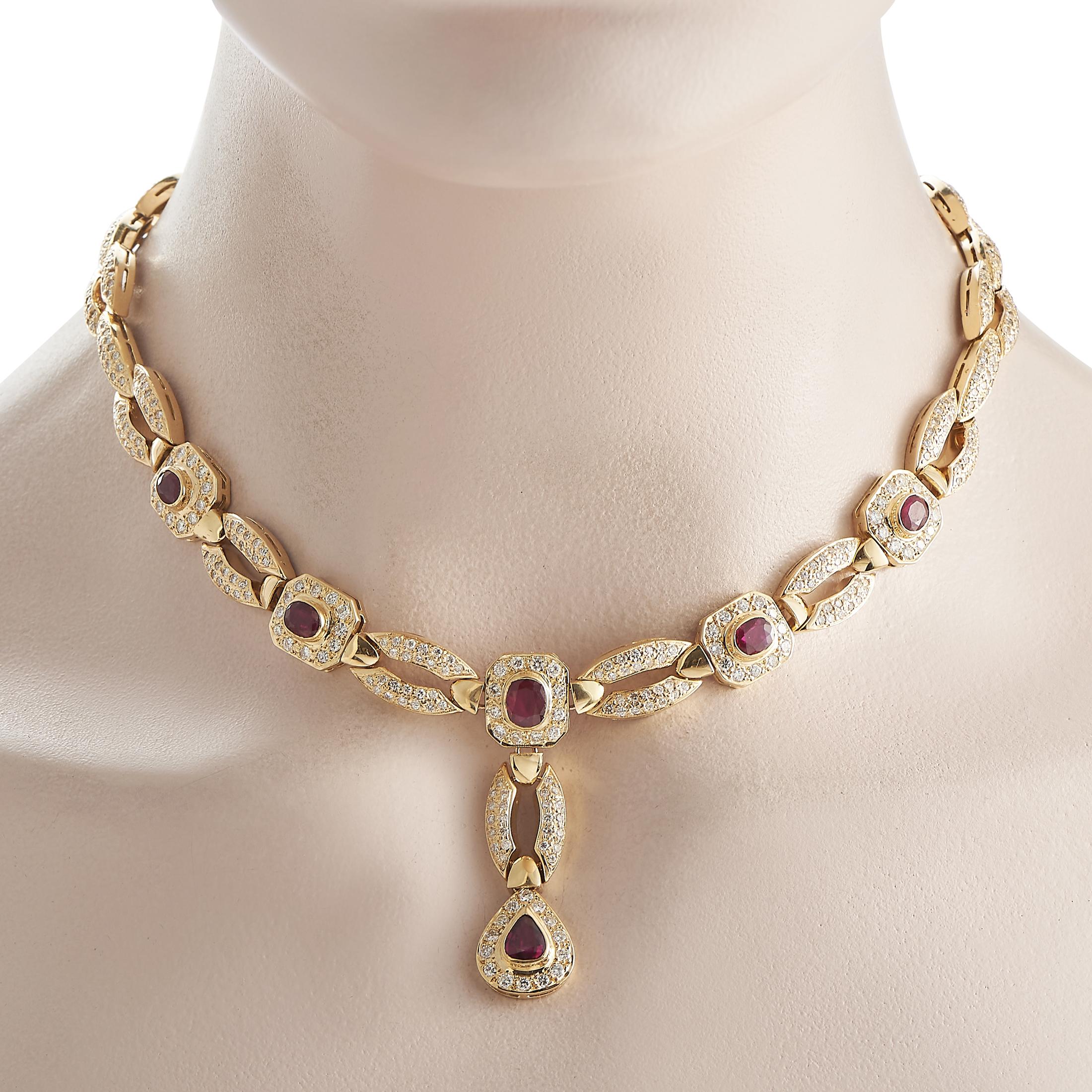 Go for full-on glamour with this diamond and ruby necklace. Designed with regal elegance in mind, this stunner features a Y-shaped chain composed of alternating pave-set oval links and ruby-punctuated octagonal plaques. The Y-tail terminates with a