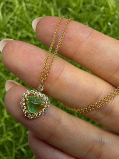 18K Yellow Gold .89 Carat Emerald and Diamond Heart Pendant Necklace