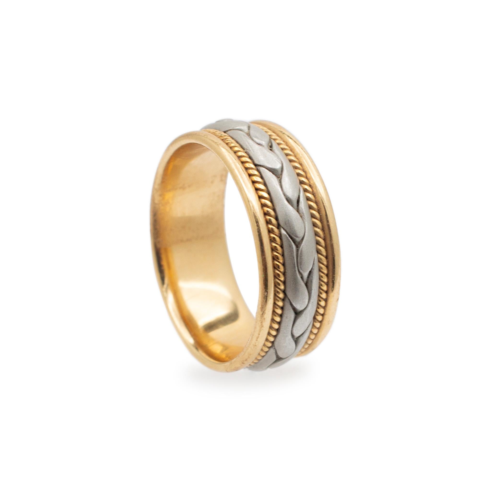 Gender: Unisex

Metal Type: 18K Yellow Gold & 950 Platinum

Size: 8

Shank Maximum Width: 8.00 mm

Weight: 9.80 grams

18K yellow gold and 950 platinum wedding band with a comfort-fit shank. Engraved with 