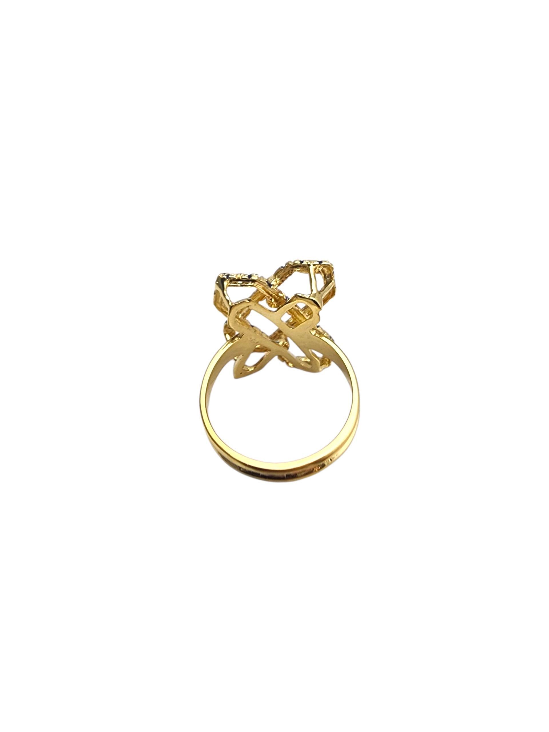18K Yellow Gold Abstract Blue Enamel X Ring -

Bold and artistic, this 18K yellow gold abstract ring features a striking blue enamel 