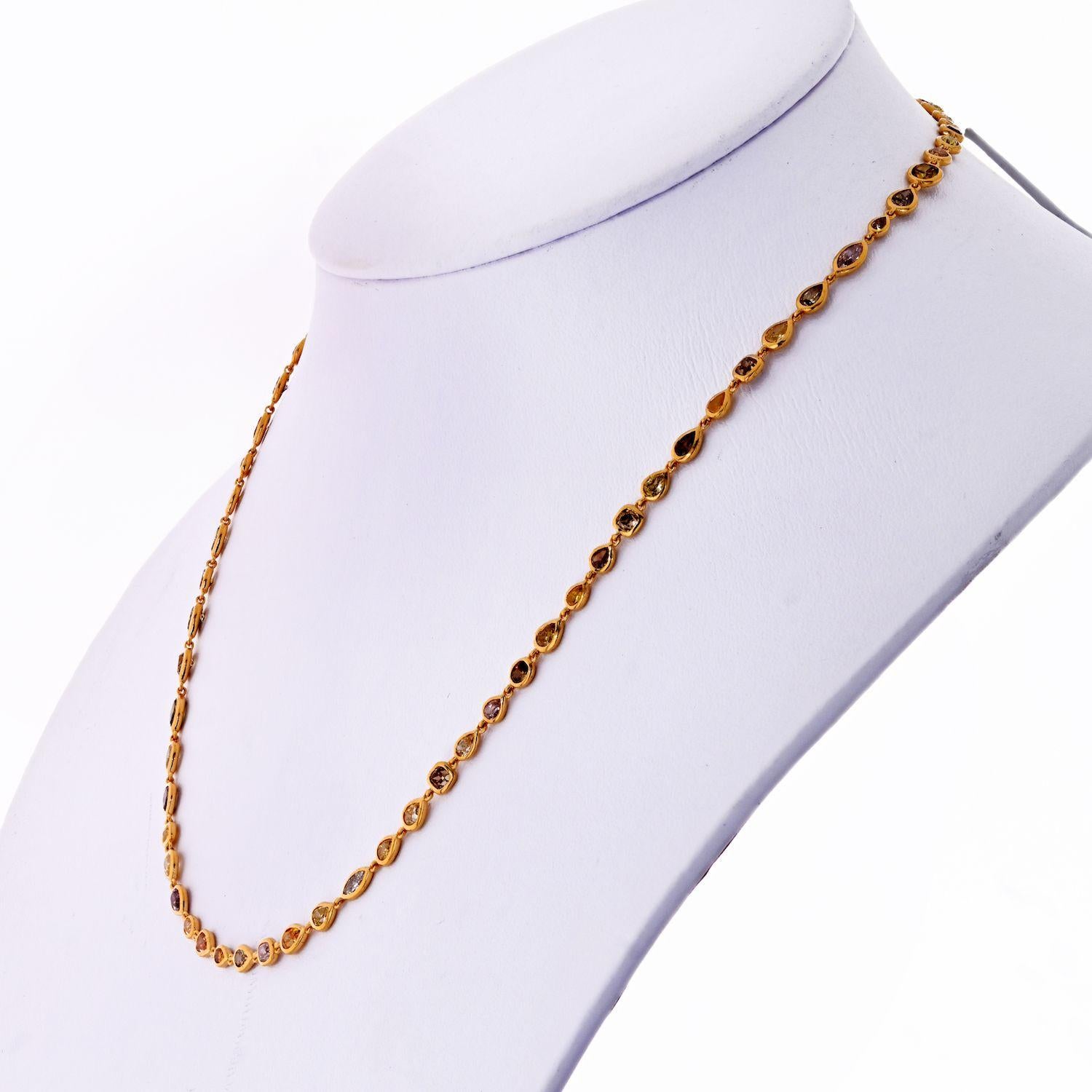 Handmade diamond by the yard necklace crafted in house by our jewelers. Made in 18K yellow gold set with all natural fancy color and white diamonds of different diamond cuts. Total Carat Weight 10cts. 
Length: 17 inches. 
Solid strong frames, smooth