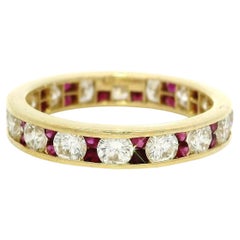 18k Yellow Gold Alternated Channel Set Ruby & Diamond Eternity Band Ring
