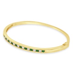 18K Yellow Gold Alternating Channel Set Emerald and Diamond Hinged Bracelet