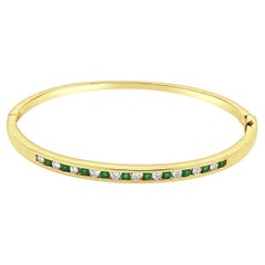 18K Yellow Gold Alternating Channel Set Emerald and Diamond Hinged Bracelet