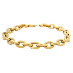 18k Yellow Gold Alternating Textured 
Polished Finish Cable Link Bracelet