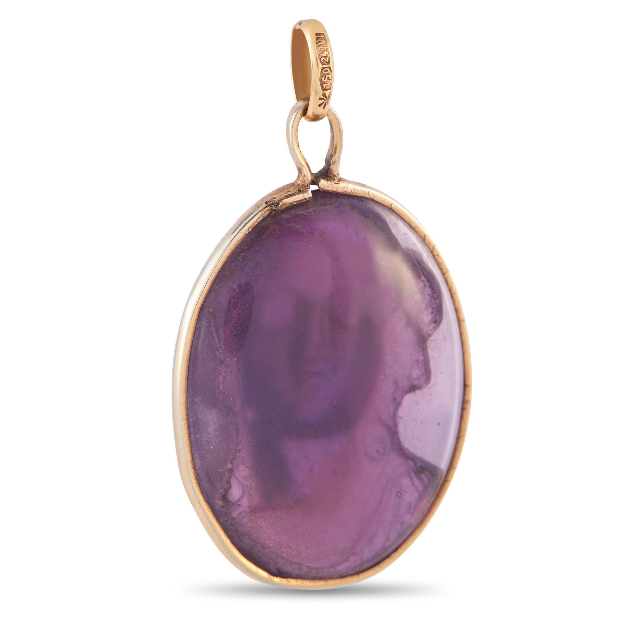 A vintage piece displaying the artistry of a bygone era. This yellow gold cameo features a carved amethyst detailed with a classical portrait. This is the jewel to get if you are looking for a treasure with romantic elegance and an old-world