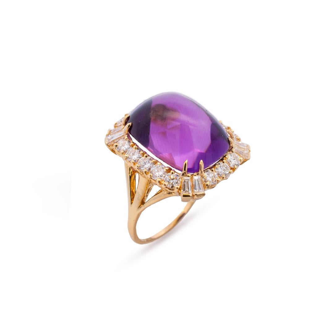 Gender: Ladies

Metal Type: 18K Yellow Gold

Size: 10

Weight: 10.80 Grams

Width: Approximately 23.18mm tapering to 1.50mm

Diameter: 19.82mm

18K yellow gold polished diamond and amethyst cocktail ring with a half round shank.

Engraved with