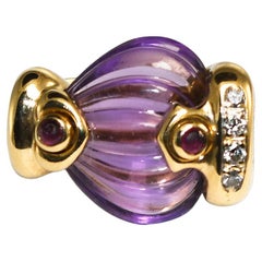 Anillo Amatista y Diamante de Oro Amarillo de 18 K