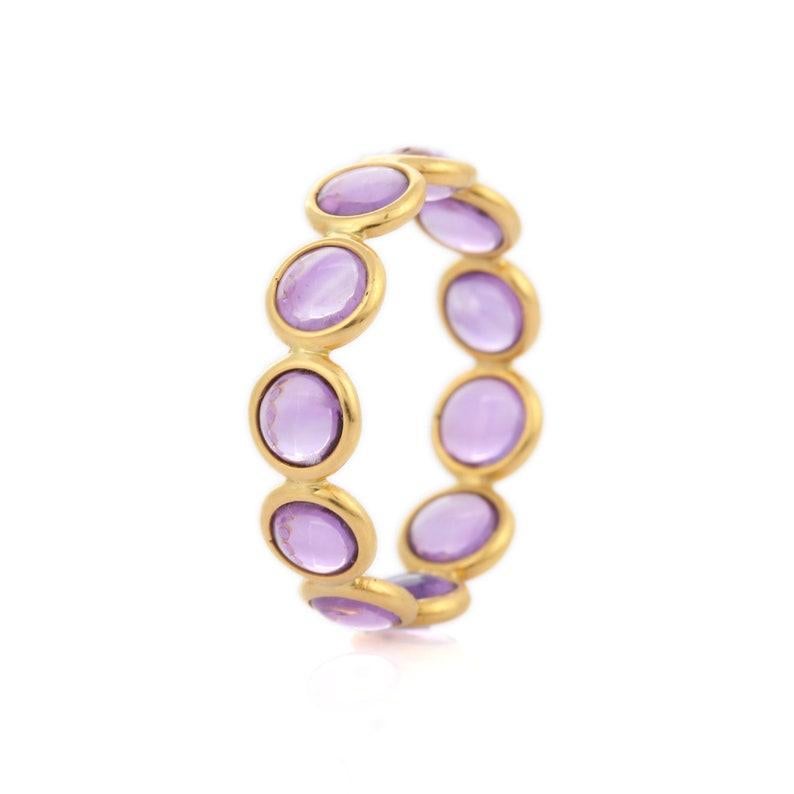 Round Amethyst Eternity Band Ring in 18K gold symbolizes the everlasting love between a couple. It shows the infinite love you have for your partner. The circular shape represents love which will continue and makes your promises stay