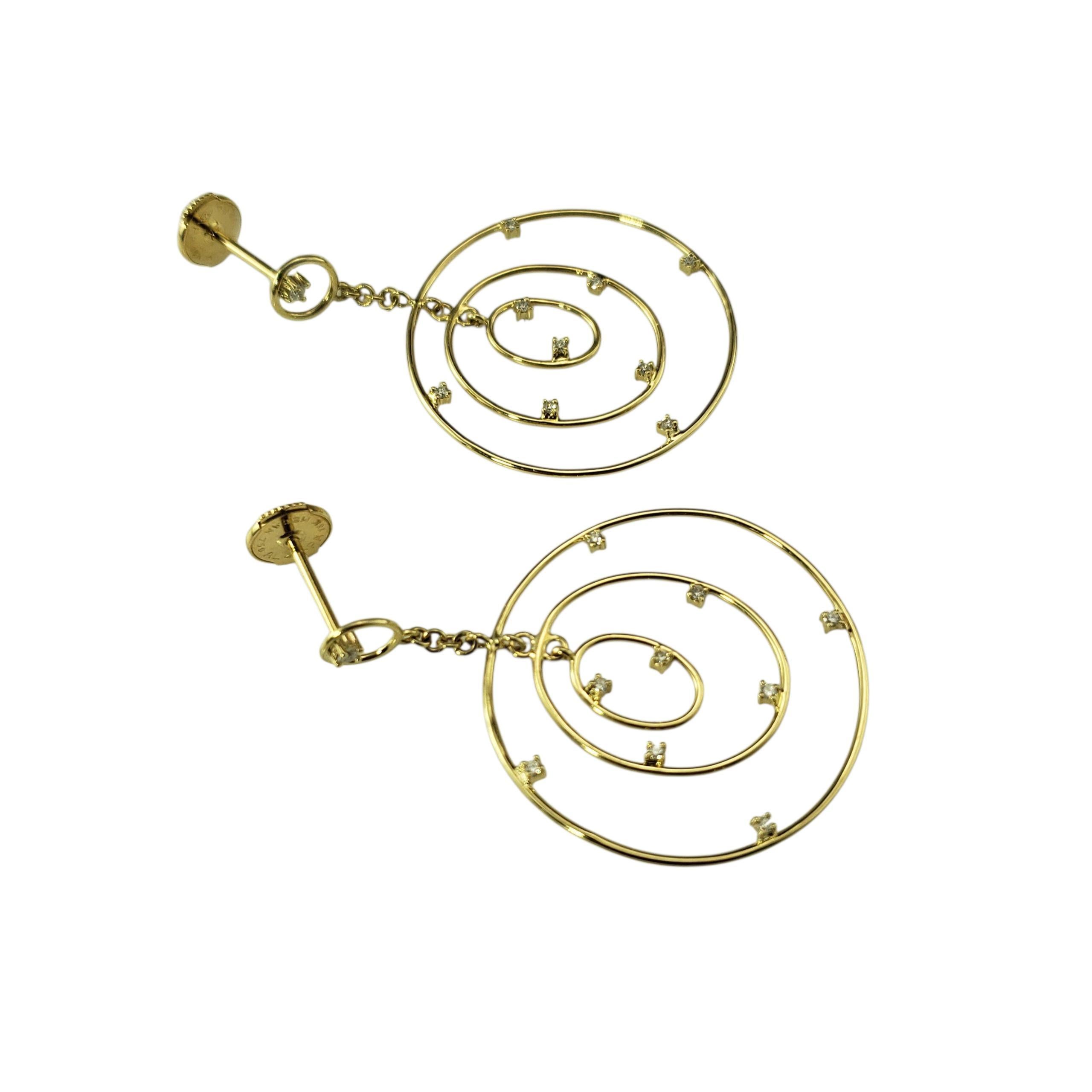 18K Yellow Gold and Diamond Circle Drop Earrings-

These bold 18K yellow gold earrings feature three open circles suspended in a dynamic dangle design. Each is accented with 10 round brilliant cut diamonds spaced evenly for subtle shimmer and modern