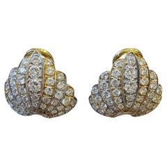 Boucles d
oreilles à pince en or jaune 18K et diamants en forme d
éventail