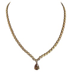 Halskette aus 18 Karat Gelbgold mit birnenförmigem, braun-gelbem Diamanten