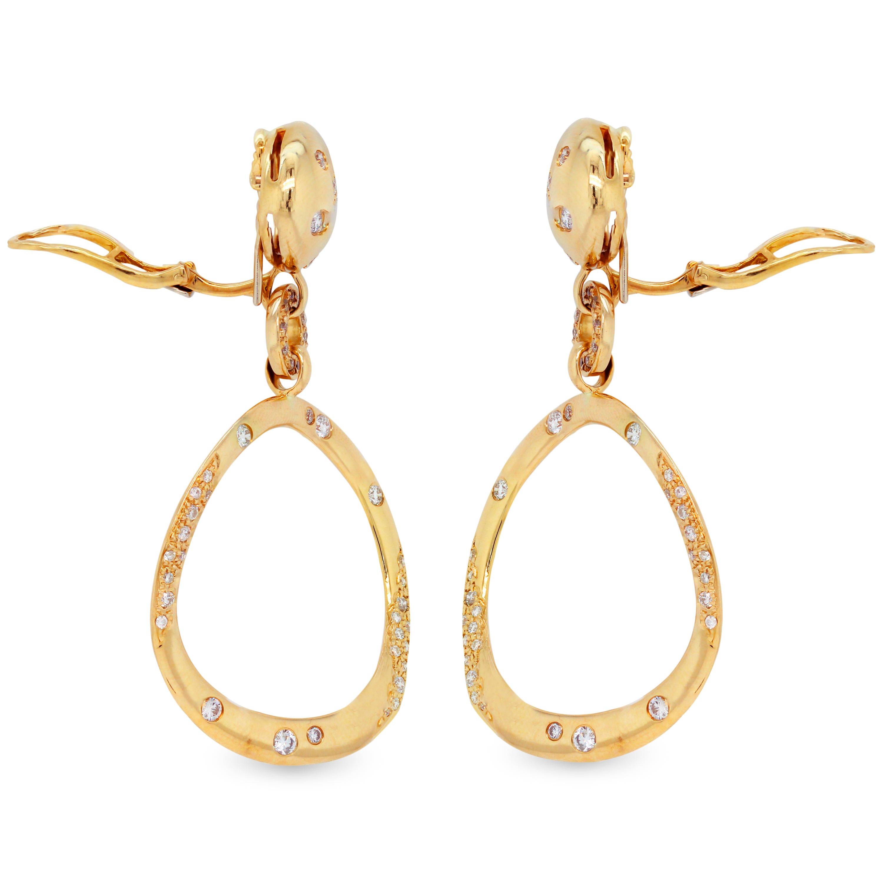 18K Yellow Gold and Diamond Round Drop Dangle Earrings

This beautiful pair of earrings features diamonds set all throughout with a circle drop.

2.50 carat G color, VS clarity diamonds total weight

Earring post moves and can be worn as pierced or