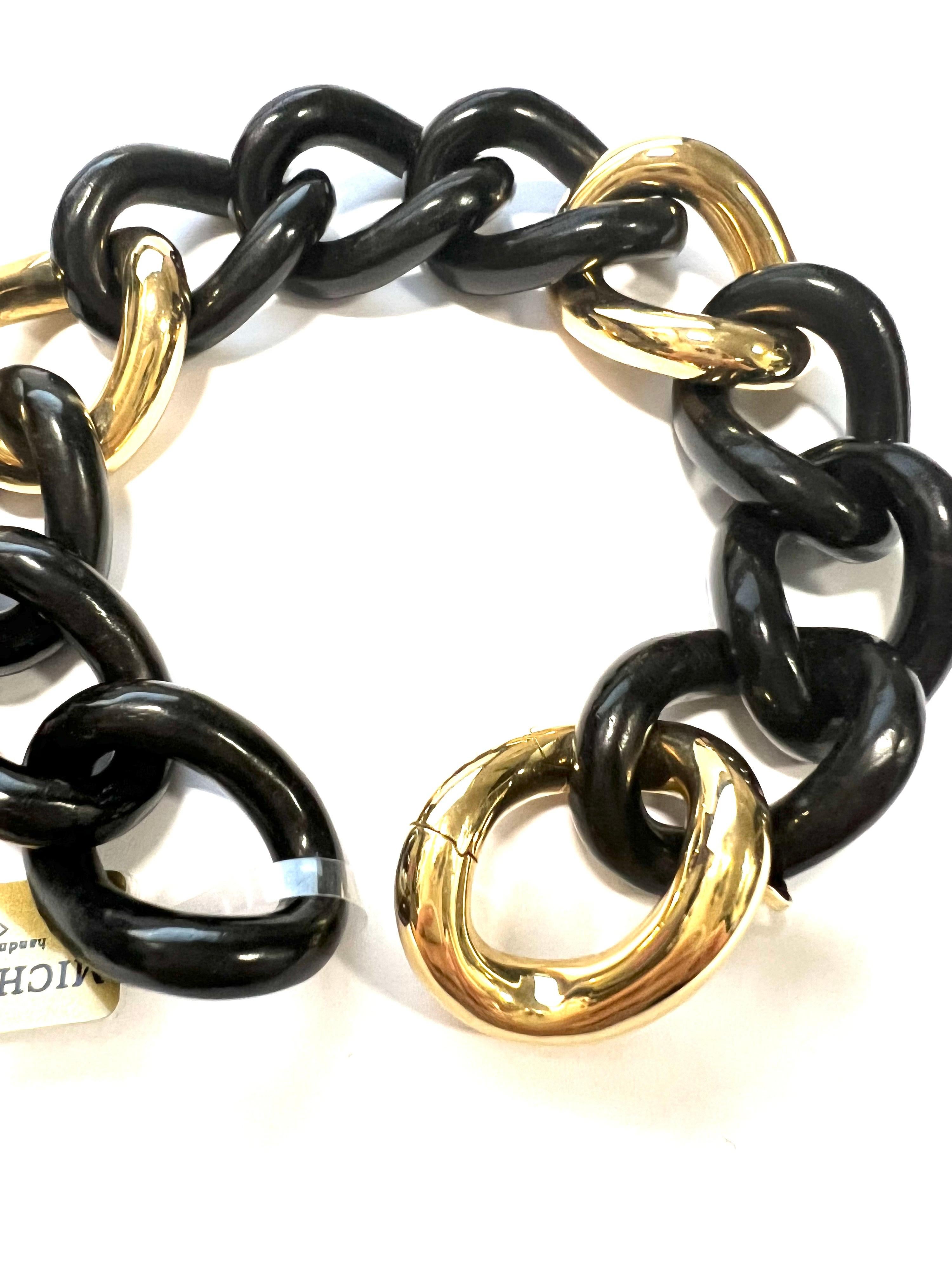 18K Yellow Gold And Ebony Groumette Bracelet
This bracelet has a hidden opening.

Total Weight gr. 40.5
Gold weight gr. 20.6
Length cm. 21
Stamp ITALY, 10 MI, 750.

