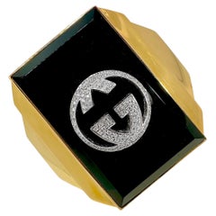 18 Karat Gelbgold und Onyx 2 Zoll breite Gucci-Manschettenknöpfe mit Diamant-GG-Logo