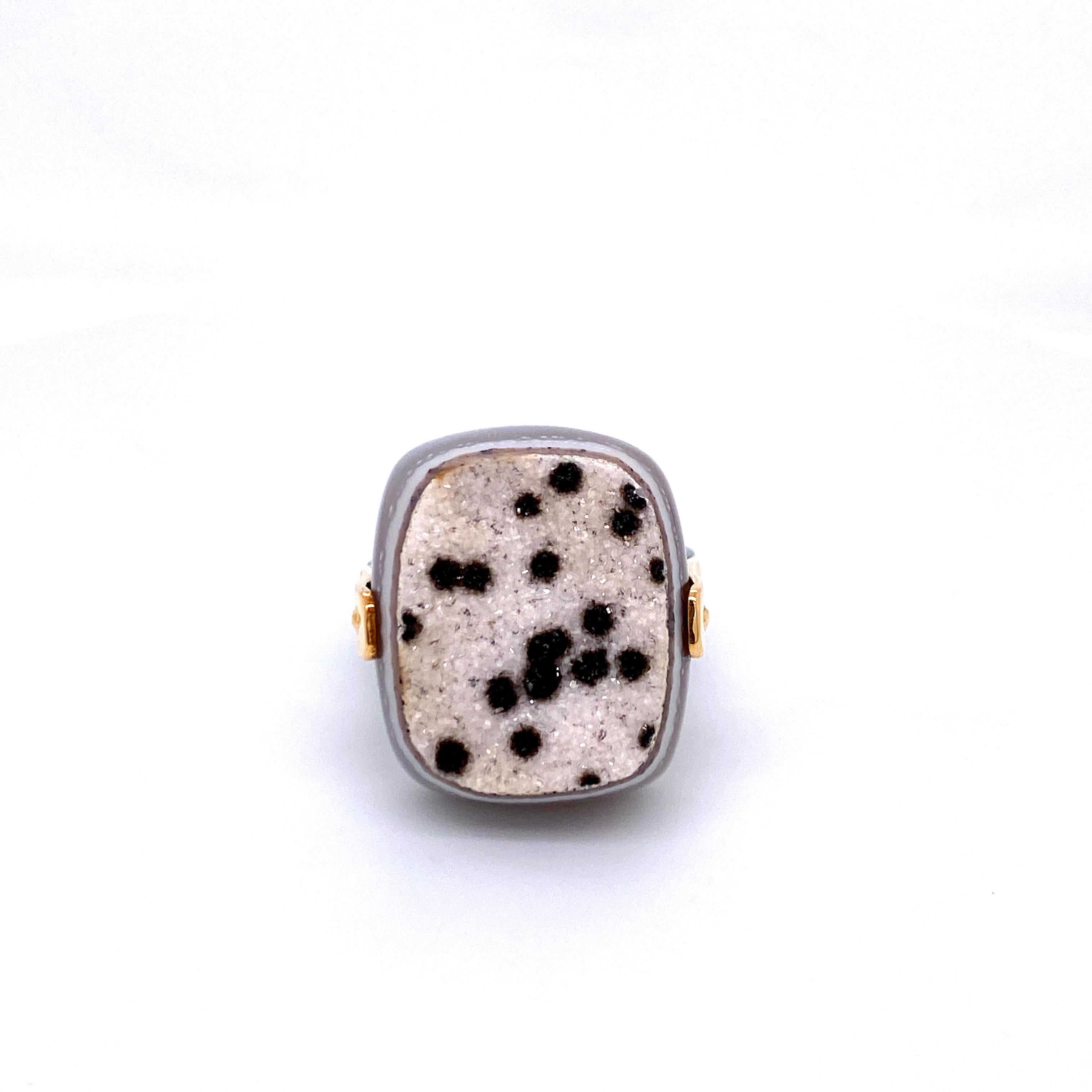 An oxidized sterling silver and 18k yellow gold ring featuring one cushion cut white druzy with black spots. Ring size 7.5. This ring was custom designed and made by llyn strong.