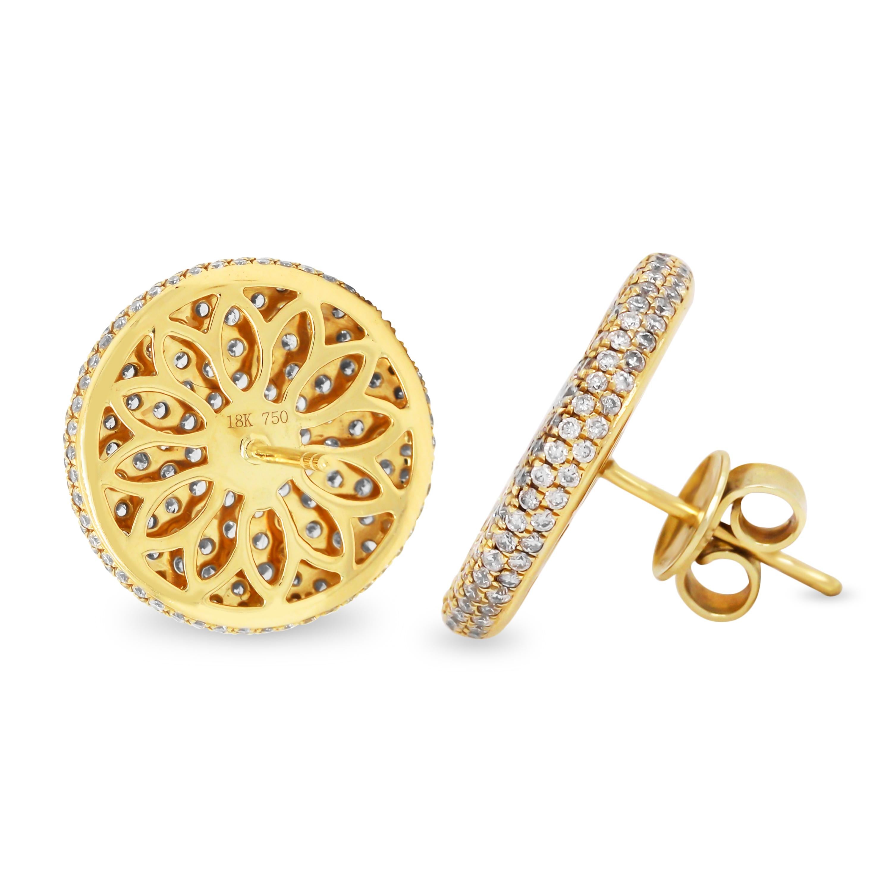 18K Yellow Gold and Diamond Circle Disk Stud Earrings

These fun, everyday earrings feature a circle, disk design with pave set diamonds all throughout.

2.82 carat G color, VS clarity diamonds total weight

0.71 inch width. They are a perfect size