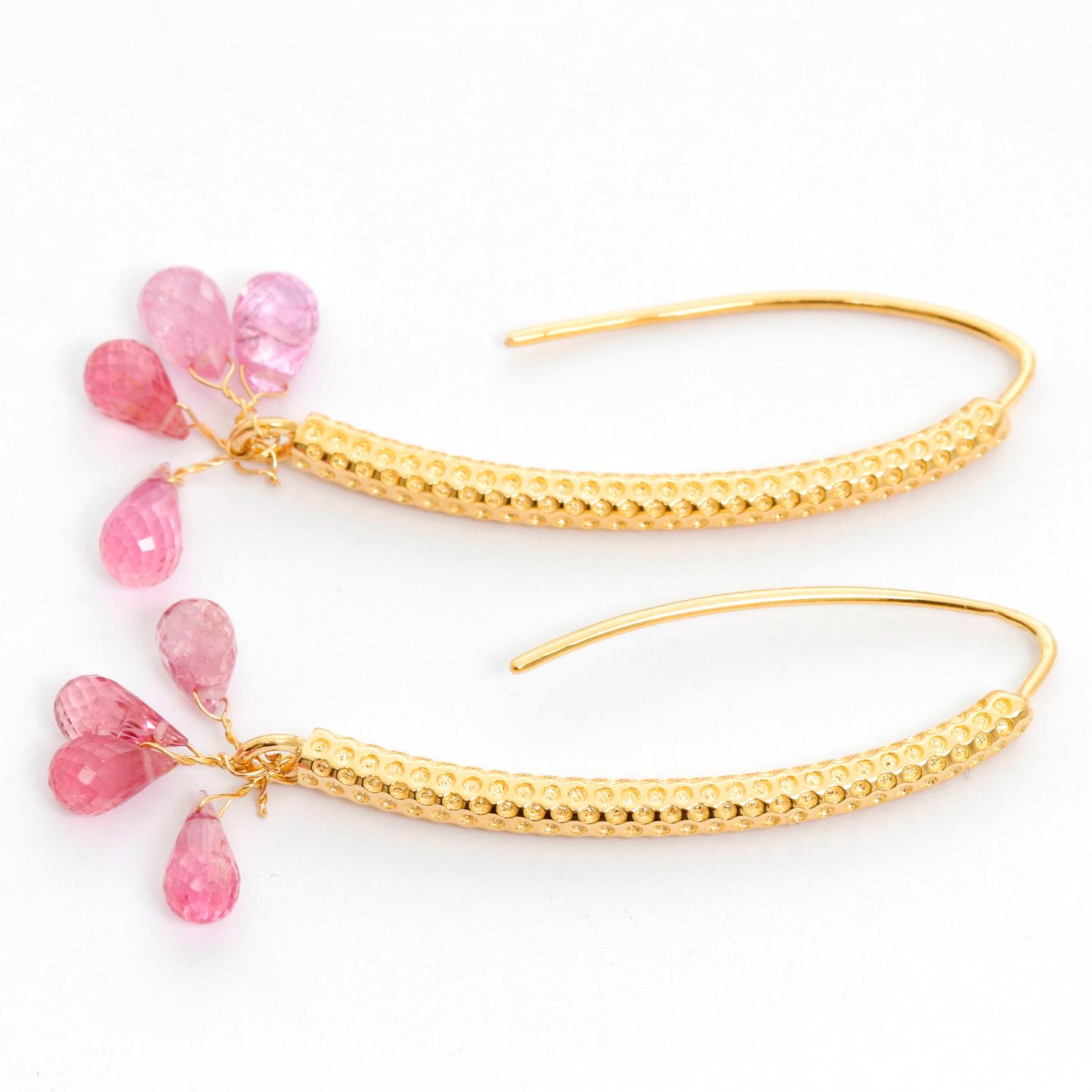 18K Yellow Gold and Pink Sapphire Briolette Earrings  - Four pink Sapphire briolettes weighing 6.25 cts hanging on 18K Yellow gold oval hoops.