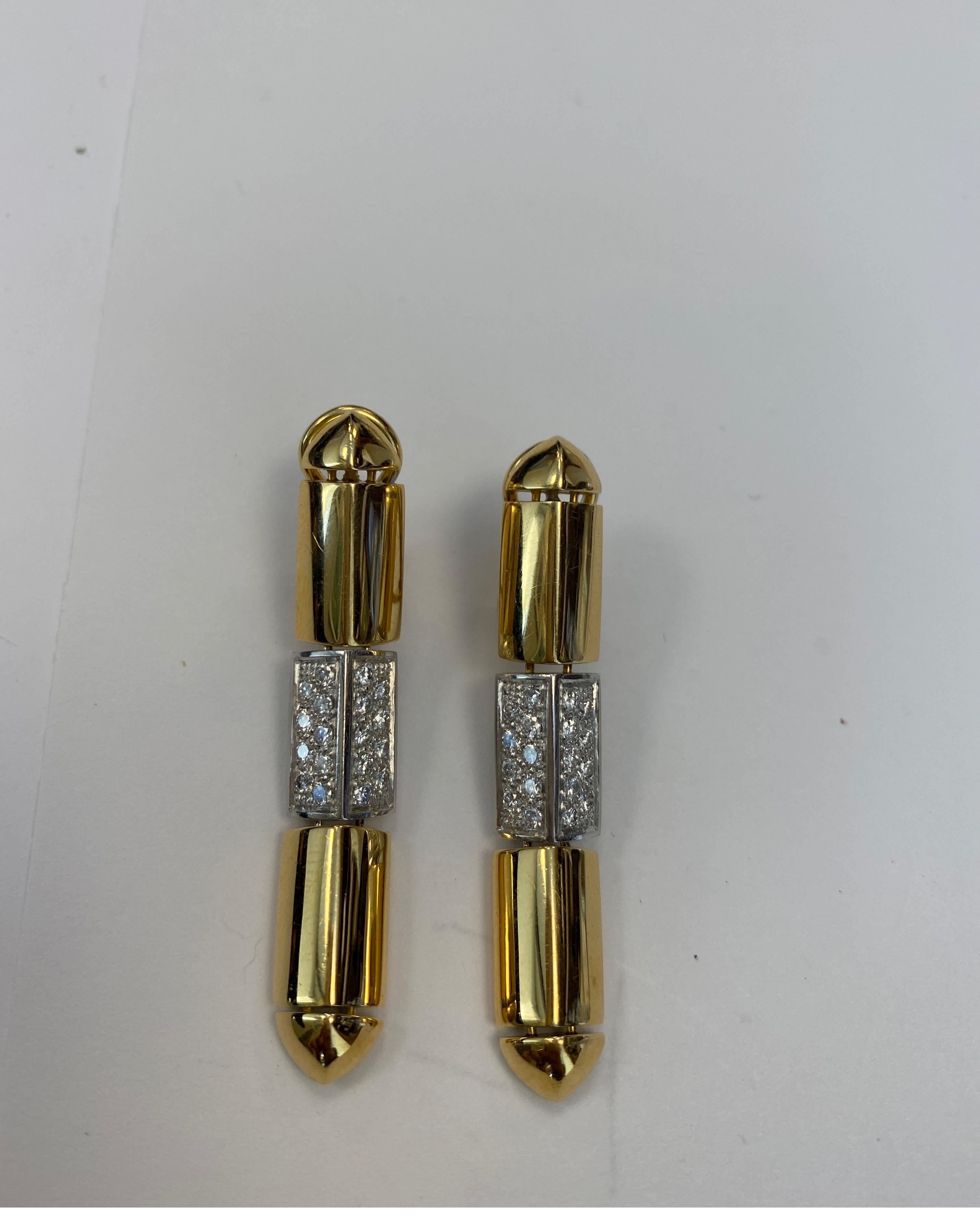 18K yellow gold and platinum flexible drop earrings, by Antonini with 36 full cut round diamonds .79cts set in platinum
Retail $5250