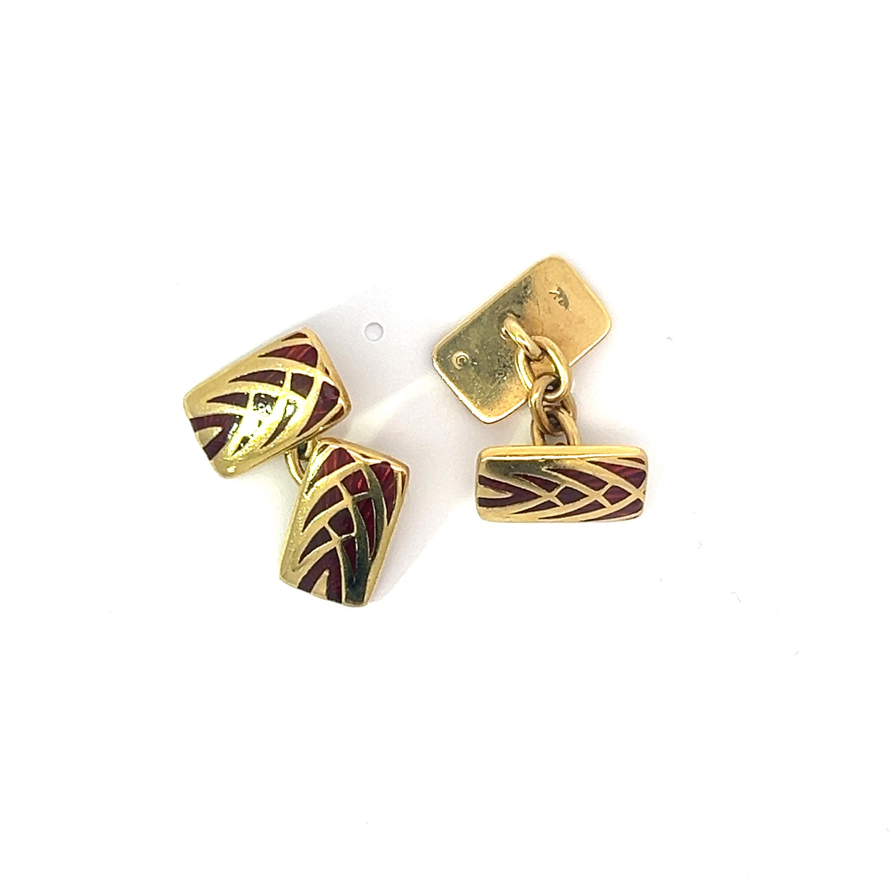 Step into the realm of refined elegance with our double-sided 18K Yellow Gold Cufflinks, each a miniature masterpiece adorned with a mesmerizing cathedral-like design. The lustrous yellow gold provides a luxurious backdrop for the red enamel,