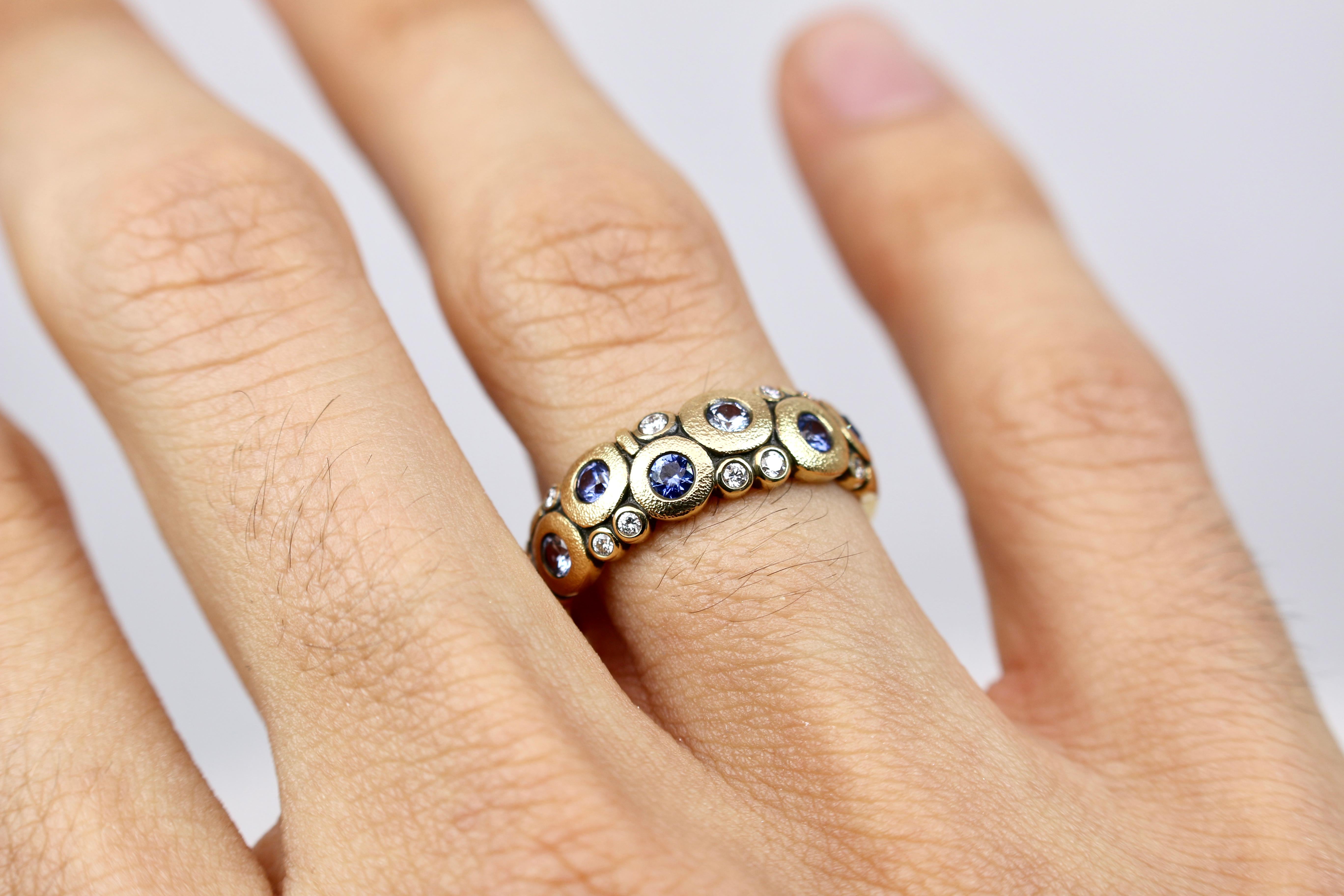 Sapphires and Diamonds have never looked better than In Sepkus’ “Candy” Dome ring. The Ring displays 9 White Diamonds at (0.12ct) each and 6 Sapphires at approximately (0.50 ct.) each. This ring is an excellent addition to any ring box that favors