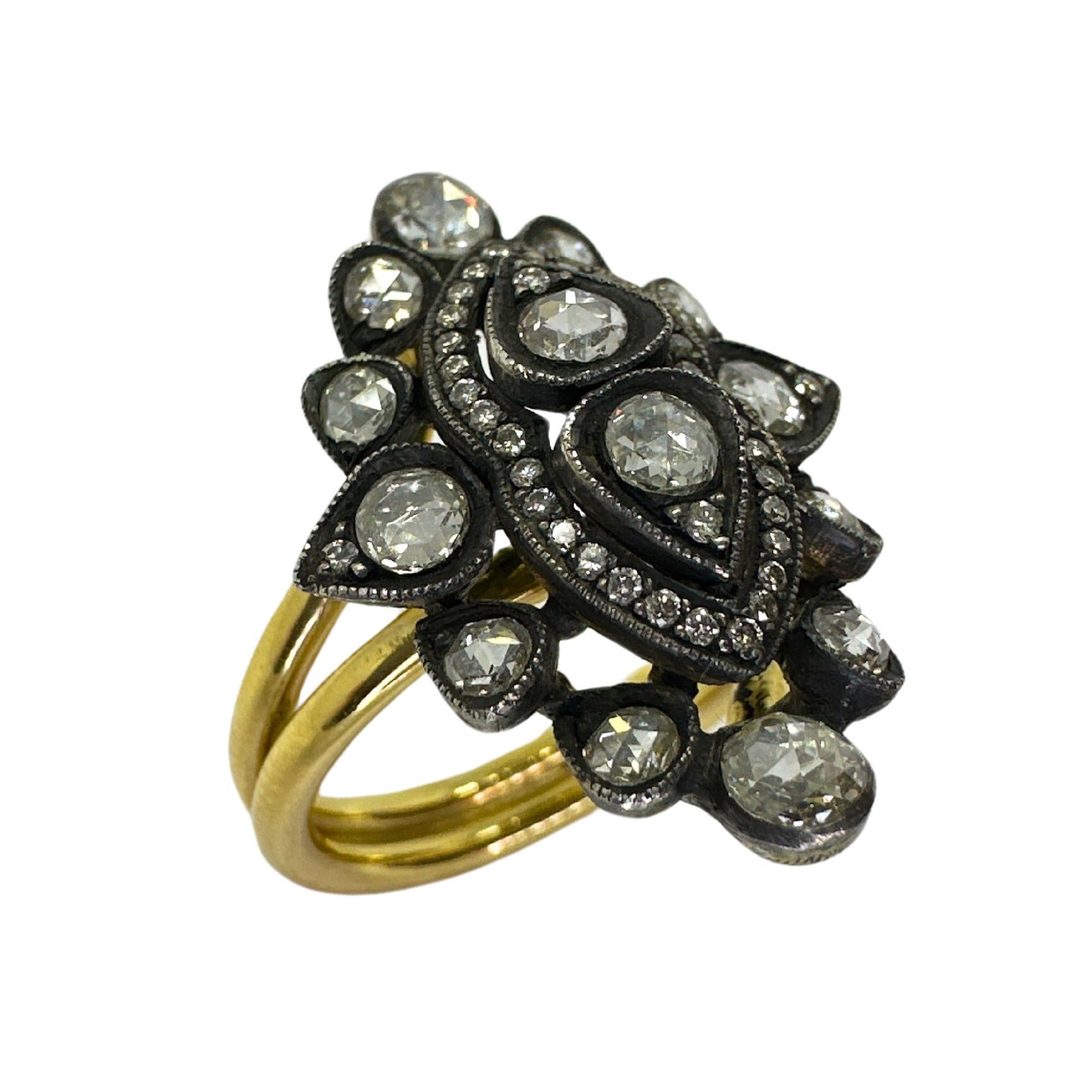Réalisée en or jaune 18 carats et ornée de 1,14 carats d'étincelants diamants taille rose, cette bague de cocktail respire l'élégance intemporelle. Ses dimensions de 1 pouce du nord au sud et son poids de 11,70 grammes en font une pièce de choix à