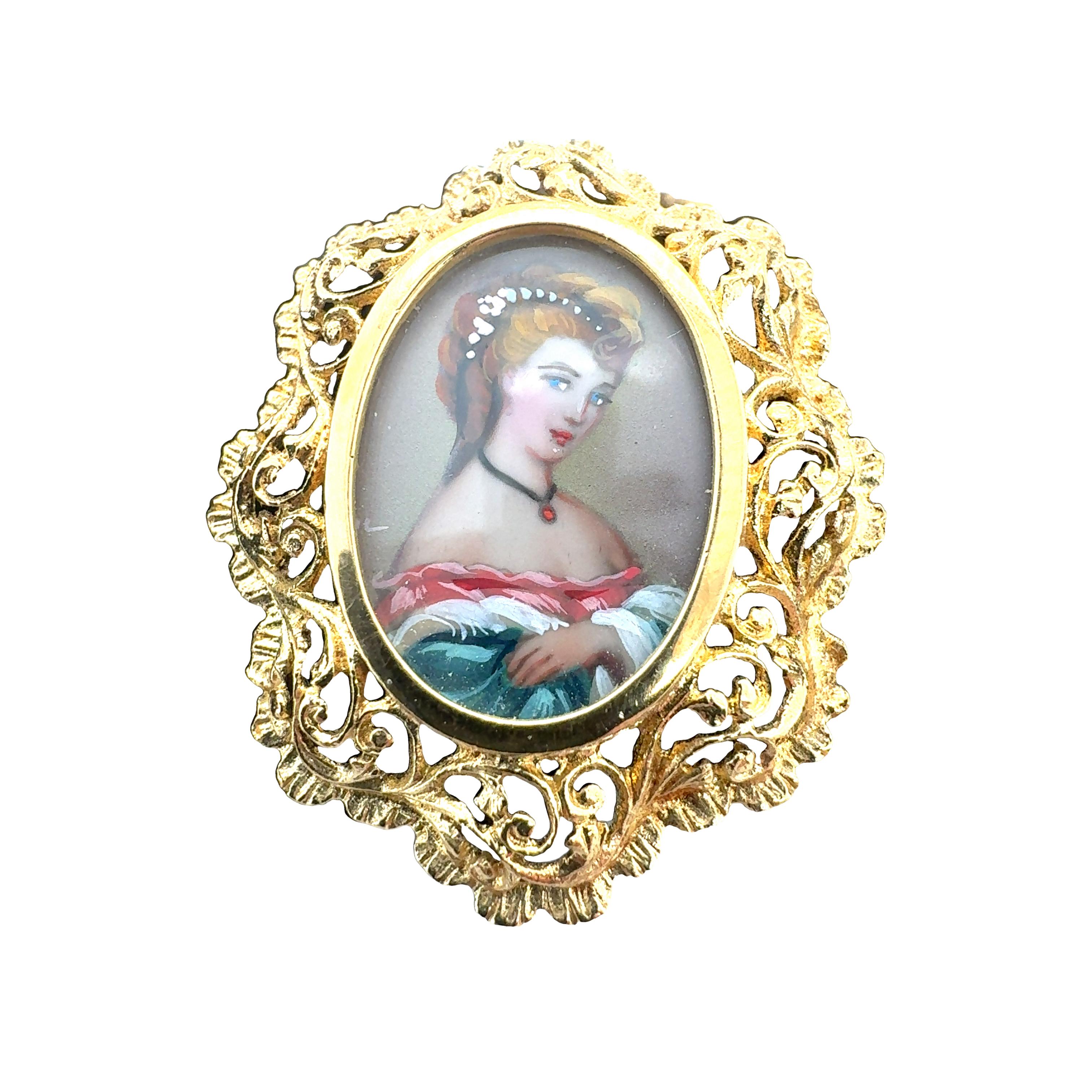 One Victorian 18K yellow gold and brown velvet choker centering an oval shaped slide pin featuring a portrait of a woman, a textured border and measuring 30 x 25 millimeters in size. Also features an 18K yellow gold buckle.

Metal: 18K Yellow
