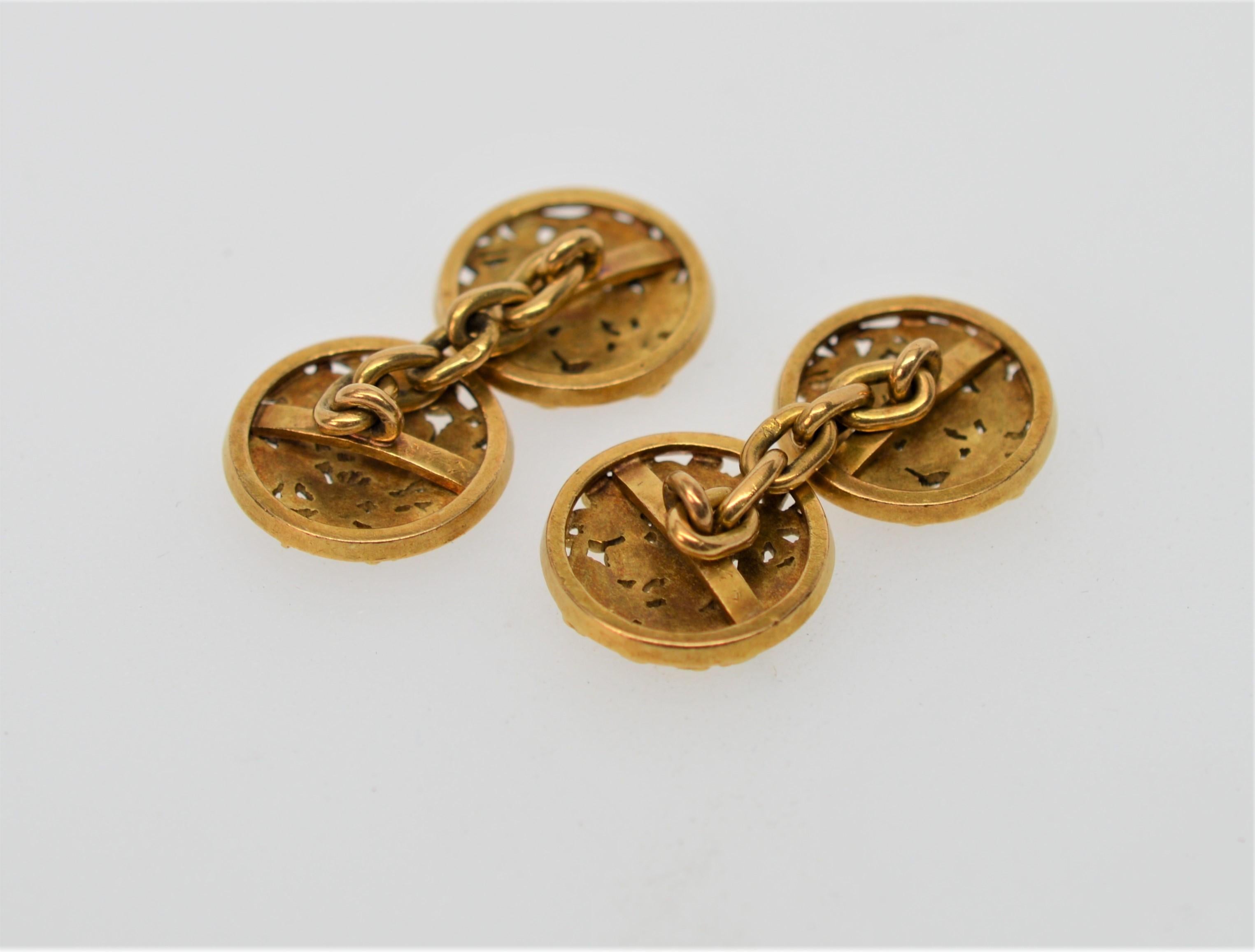 Antique English or Continental 18K Yellow Gold Cuff Links (pair) decorated with hand-applied Clover Leaves. Measuring  15mm Round, these Cuff Links are joined by a 3/4 inch 18K Yellow Gold Chain. Total weight 8.8 pennyweight 18K Gold. In Gift Box.