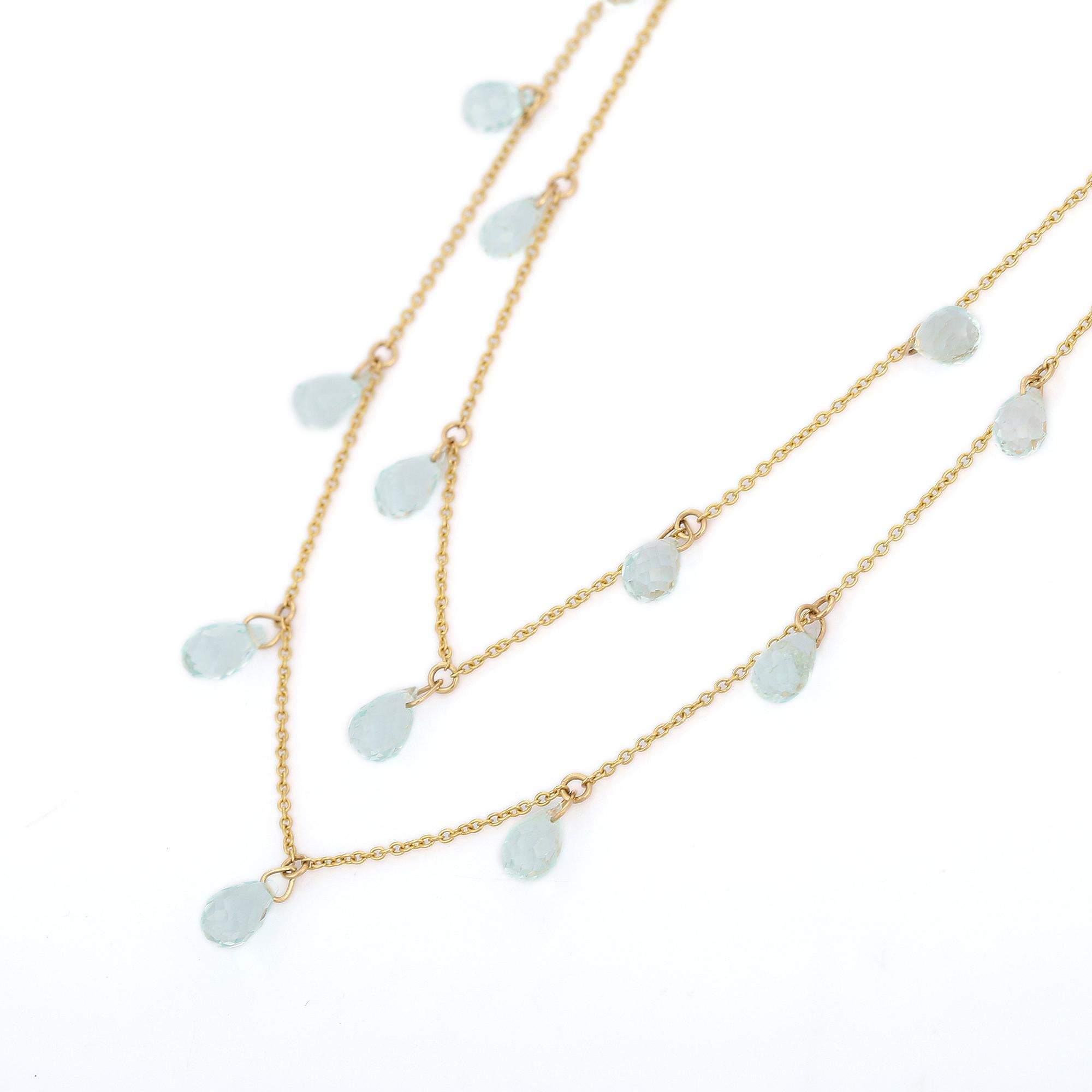 Aquamarine Necklace in 18K Gold studded with drop cut aquamarine pieces.
Accessorize your look with this elegant aquamarine drop necklace. This stunning piece of jewelry instantly elevates a casual look or dressy outfit. Comfortable and easy to