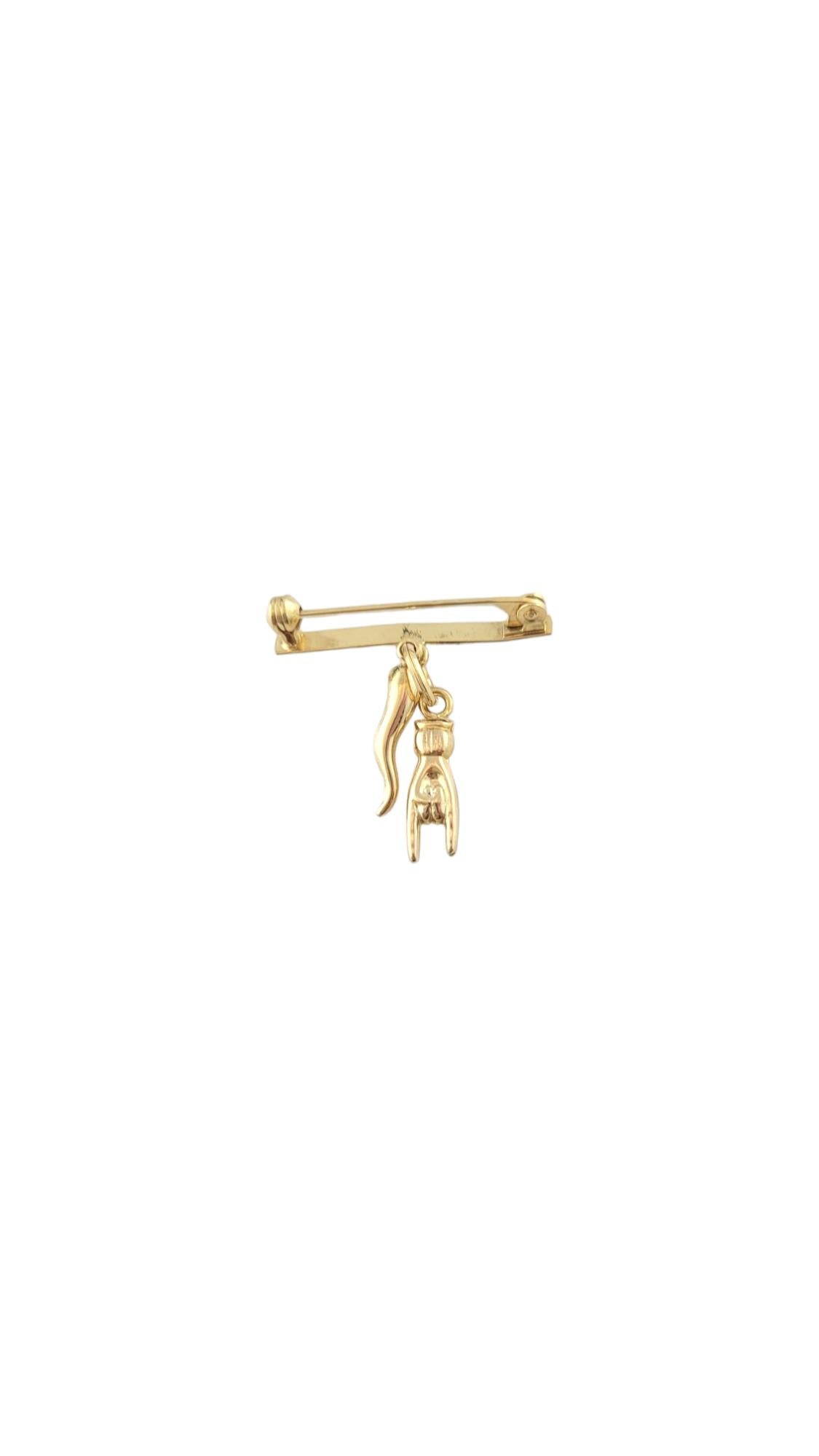 Vintage 18 Karat Yellow Gold Baby Italian Horn & Hand ( Mano Cornuto ) Pin - 

This gorgeous pin features the Italian horn & hand which represents good luck in Italian culture. 

Size: 30.5 mm x 29.2 mm x 8.6 mm. 

Stamped: 750

Weight: 2.2 dwt./