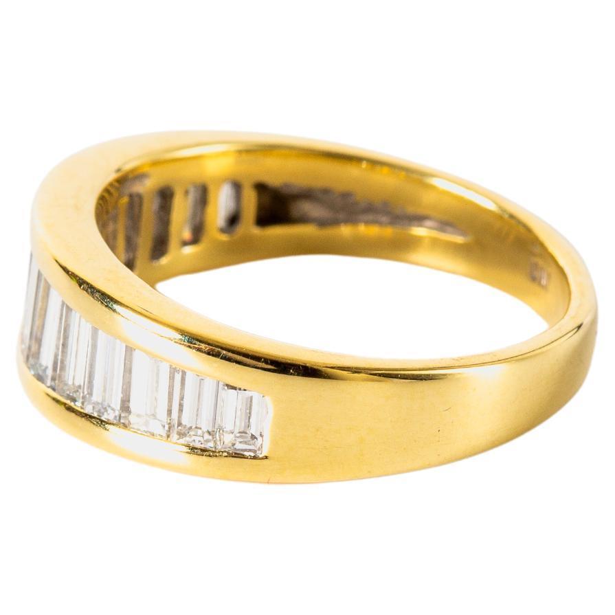 Material: 18k Yellow Gold
Gemstone: Diamond 1.25 cttw
Size: 6
Weight: 5.1 grams

Classic diamond band, featuring 1.25 carats total weight. Can be worn on its own or with your engagement ring.